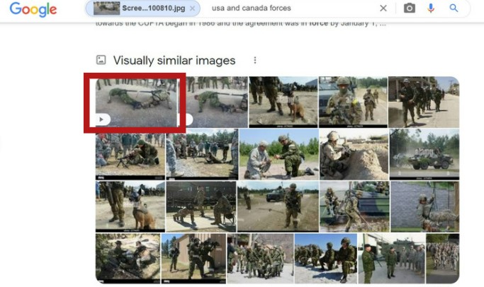 Tug of war between US and Canadian soldiers. 