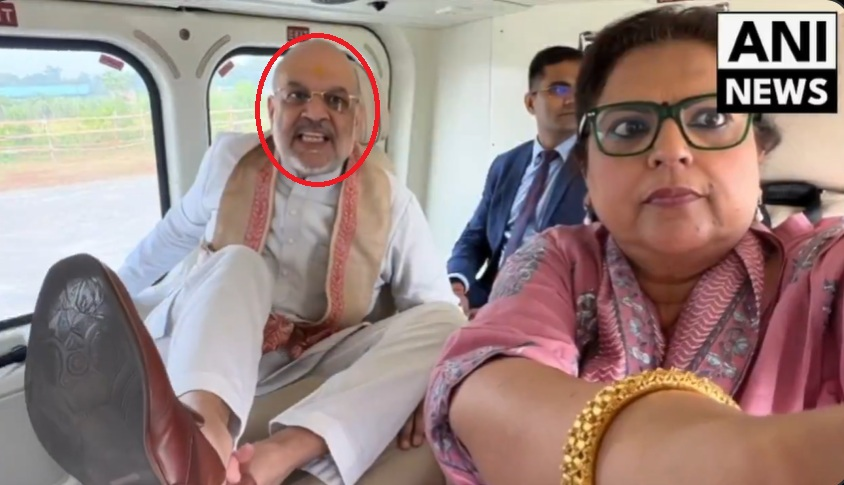 அமித் ஷாவின் காலணிகளை ஊடகவியலாளர் நவிகா குமார் துடைத்ததாக பரவும் வீடியோ.