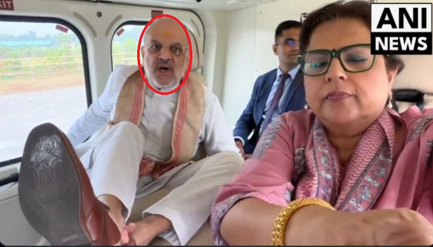 அமித் ஷாவின் காலணிகளை ஊடகவியலாளர் நவிகா குமார் துடைத்ததாக பரவும் வீடியோ.