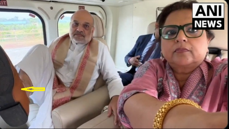 அமித் ஷாவின் காலணிகளை ஊடகவியலாளர் நவிகா குமார் துடைத்ததாக பரவும் வீடியோ.